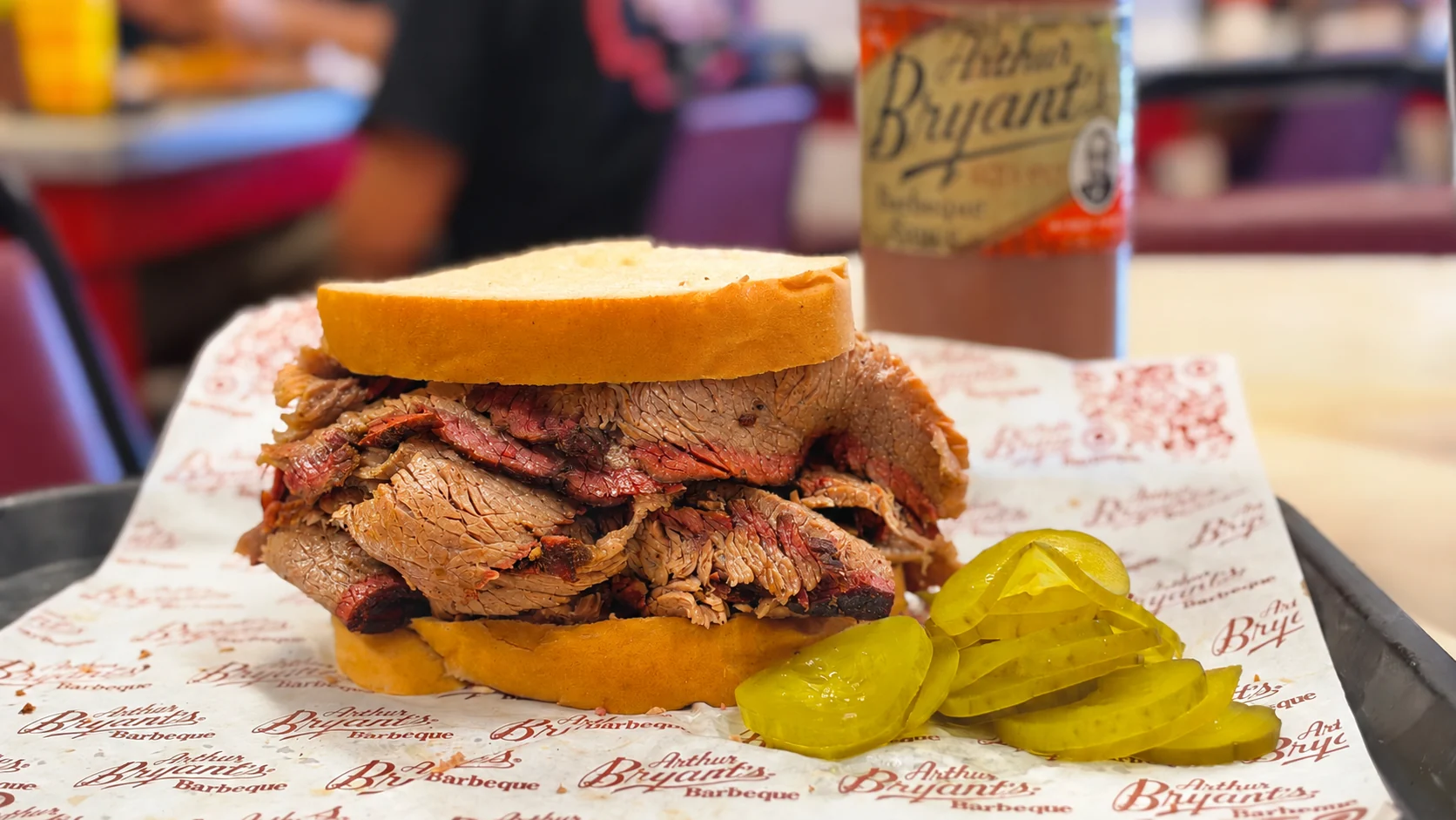 Arthur Bryant’s original barbecue sandwich piled with sliced smoked beef and pickles