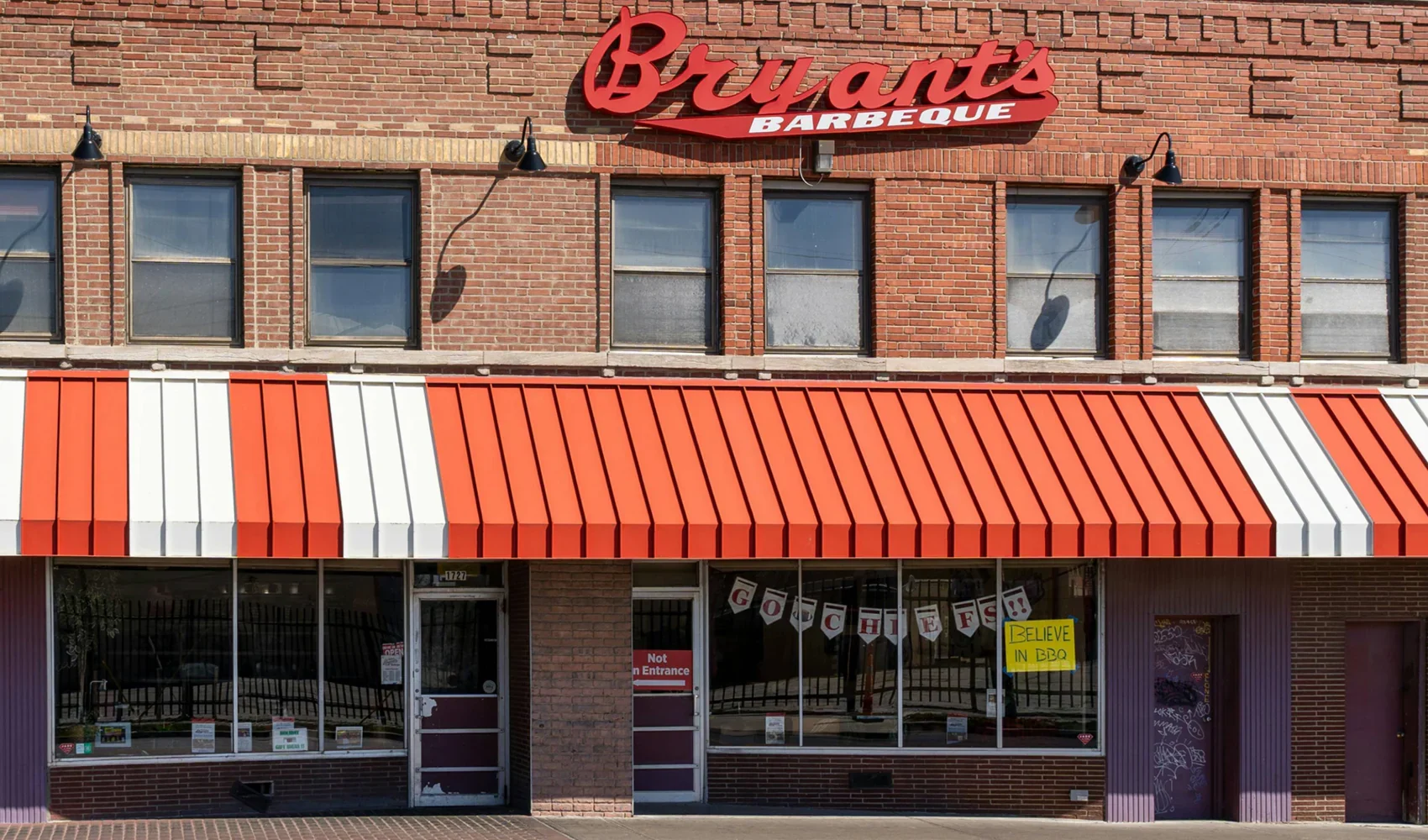 The brick Arthur Bryant’s restaurant on Brooklyn Avenue, with its red sign and red-and-white awning